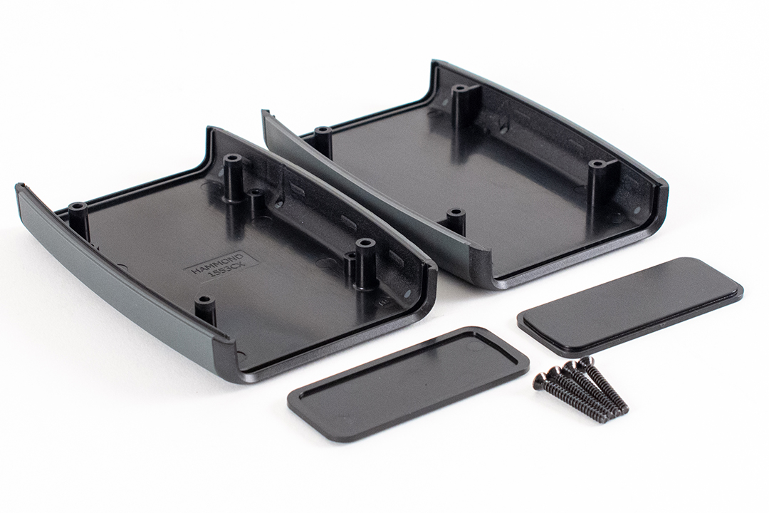 1553CXBK black dual end panel handheld enclosure with grey overmold