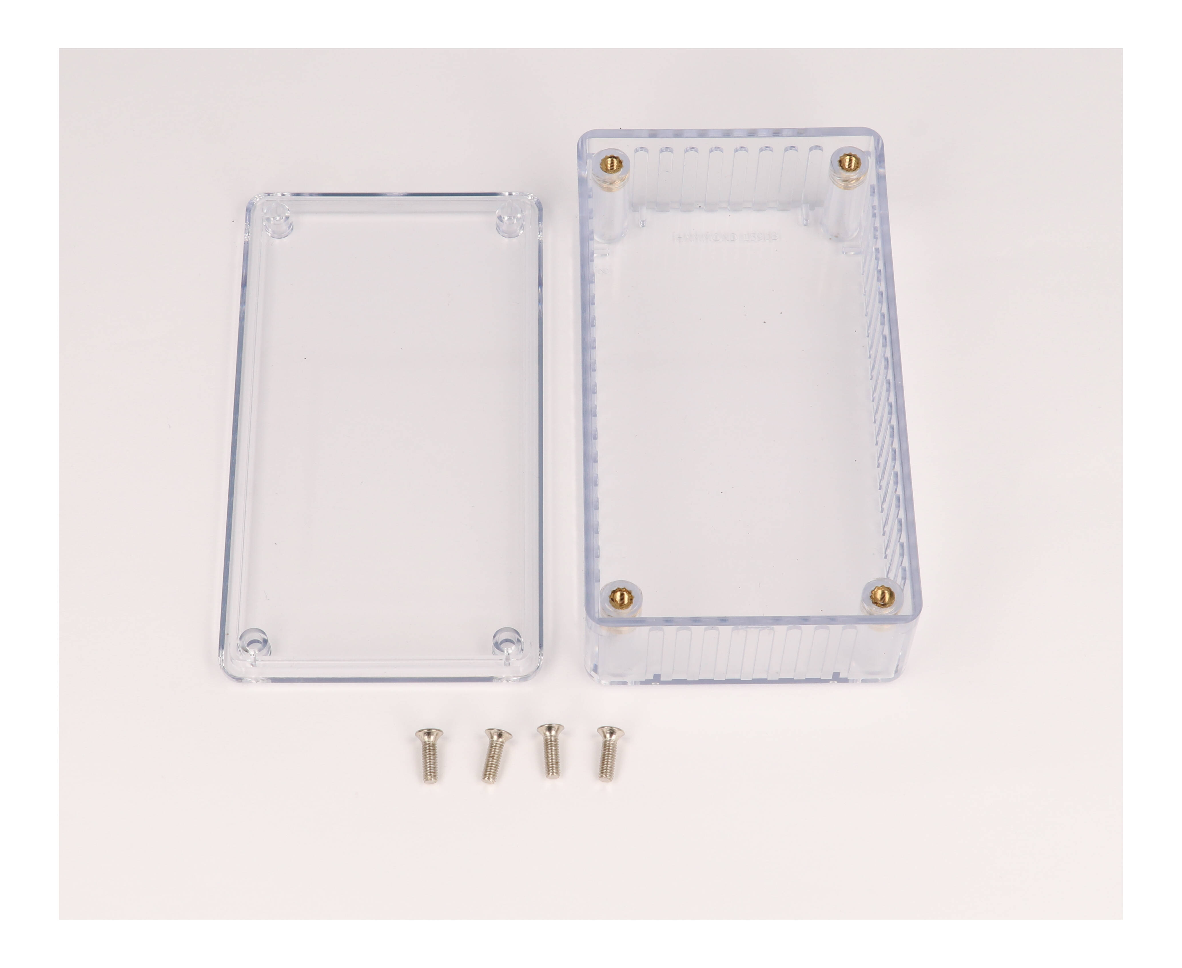 1591BTCL crystal clear translucent polycarbonate enclosure, 112 x 62 x 31 mm, with lid and cover screws