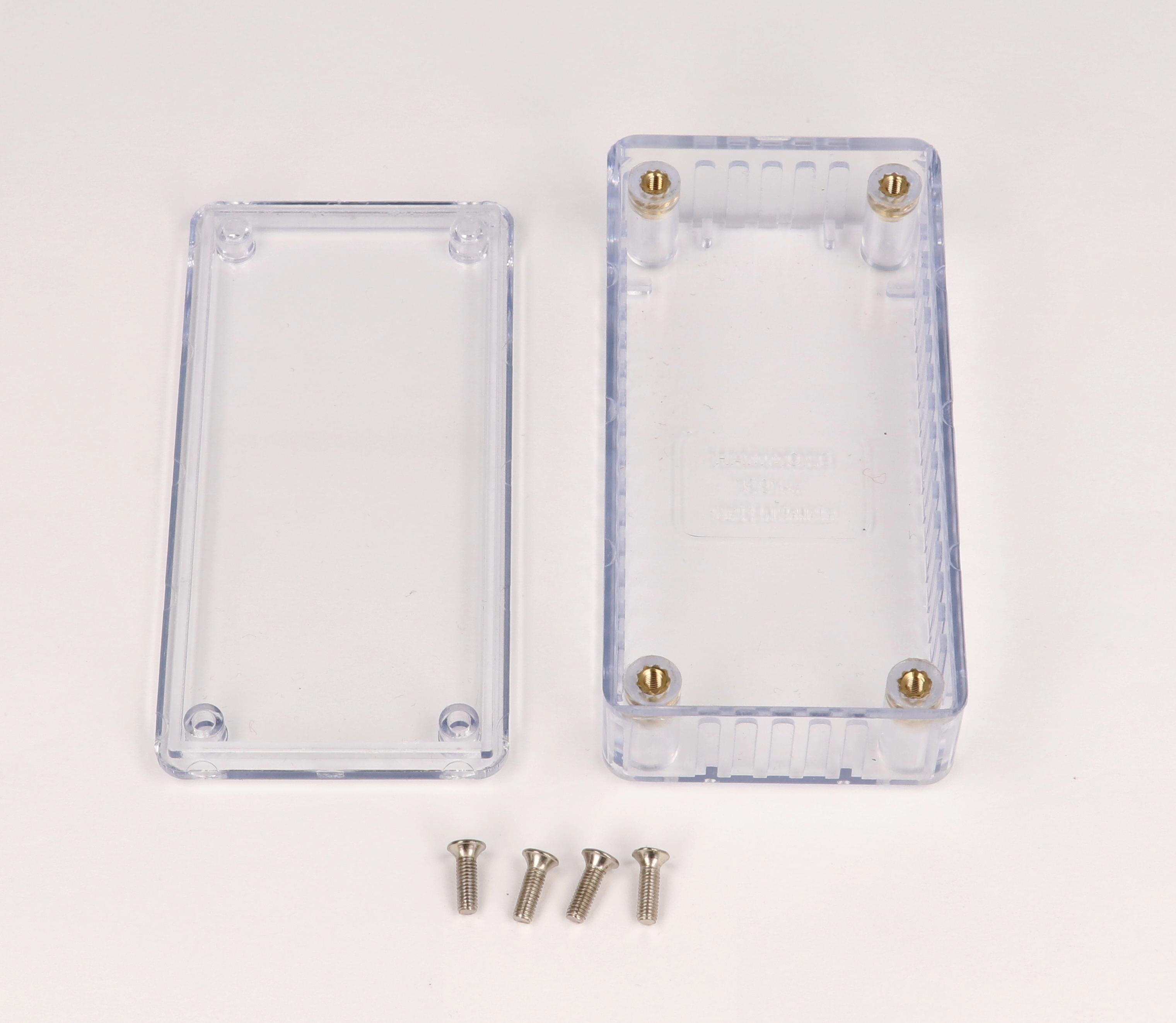 1591ATCL crystal clear translucent polycarbonate enclosure, 100 x 50 x 25 mm, with lid and cover screws
