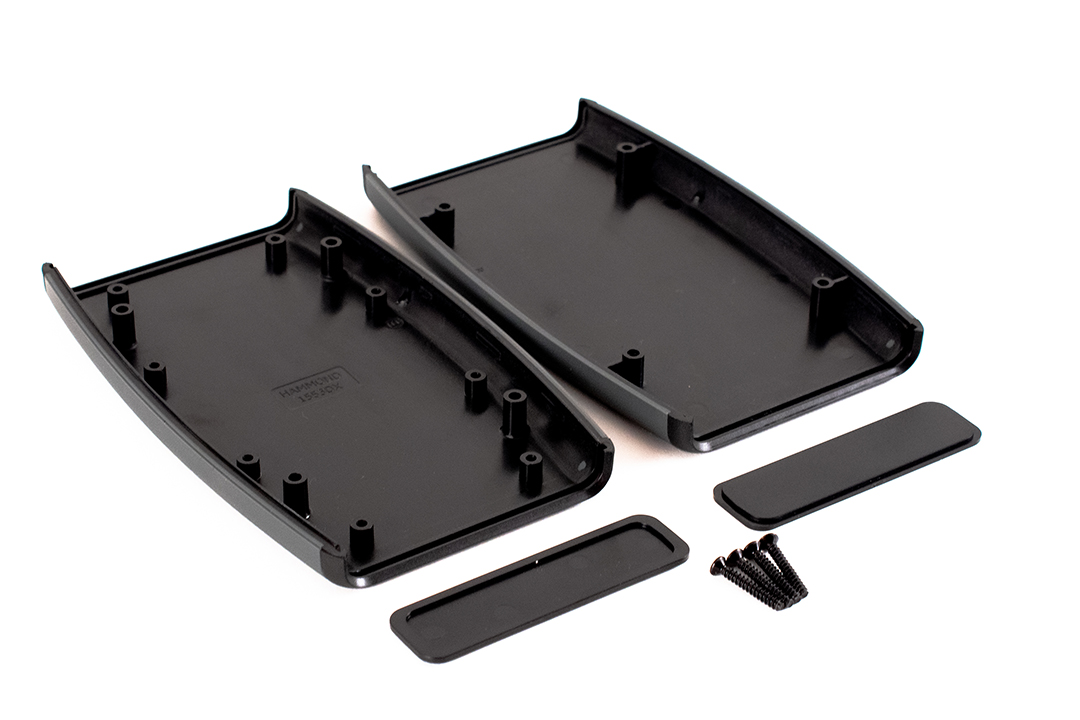 1553DXBK black ABS hand held enclosure with gray soft side overmold and two end panels