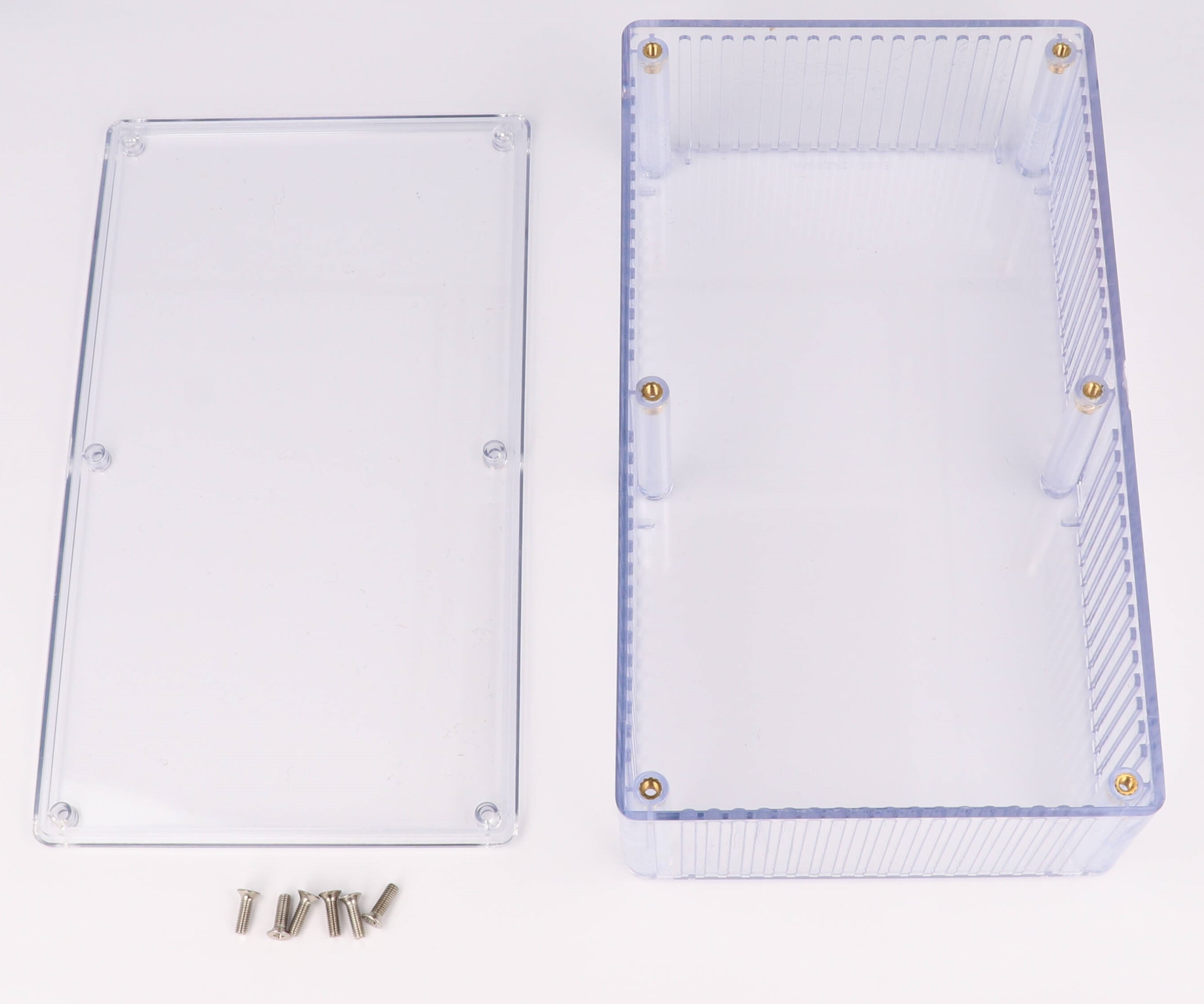 1591ETCL crystal clear polycarbonate enclosure showing internal card guides, 190 x 111 x 61 mm