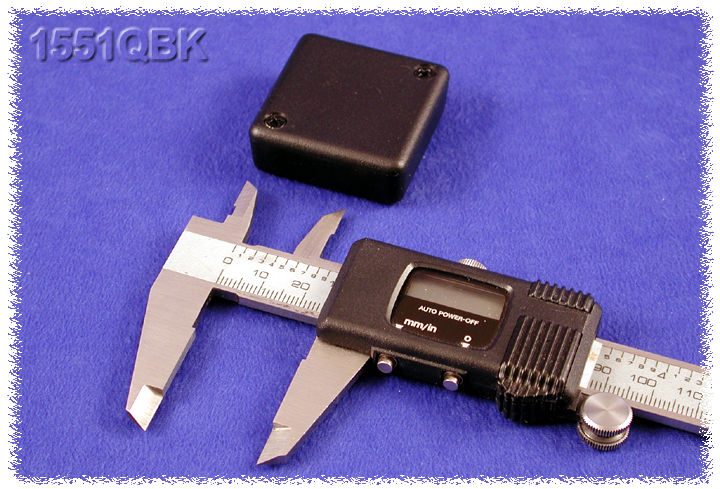 1551QBK black ABS plastic miniature enclosure, 40 x 40 x 15 mm, shown with lid and cover screws
