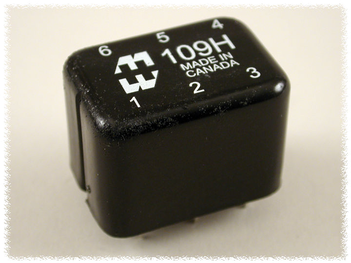 109R miniature epoxy potted audio transformer in a black molded case with P.C. board pins — view 2