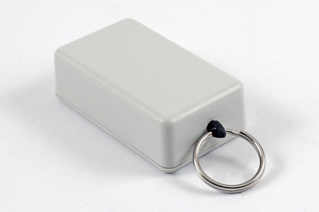 Hammond 1551HRGY light gray ABS plastic enclosure with key ring, 60 x 35 x 20 mm