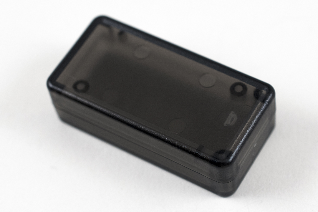 1551BTSK translucent smoke ABS subminiature enclosure, 50 x 25 mm