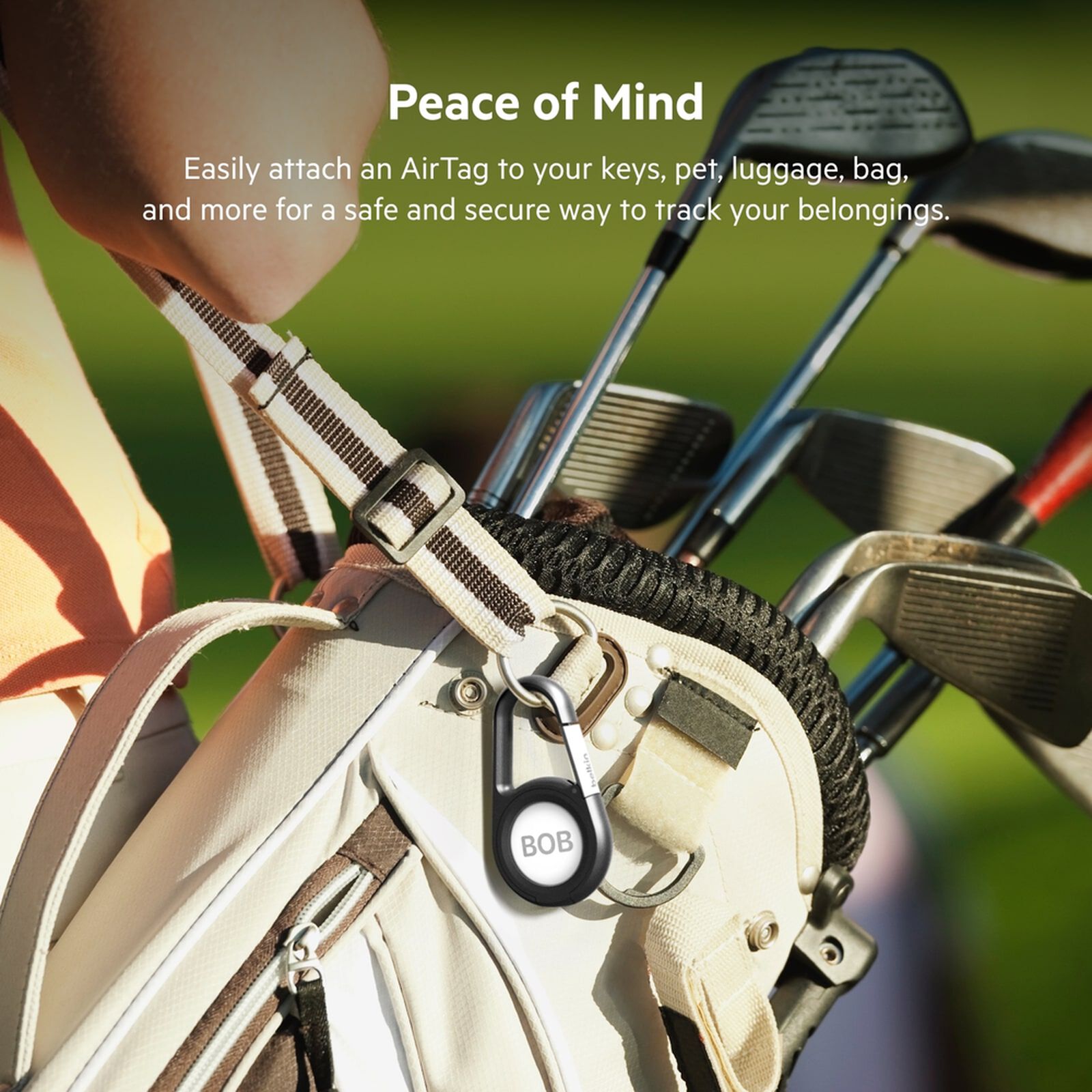 Black Belkin Secure Holder with a metal carabiner clip holding an Apple AirTag. — view 3