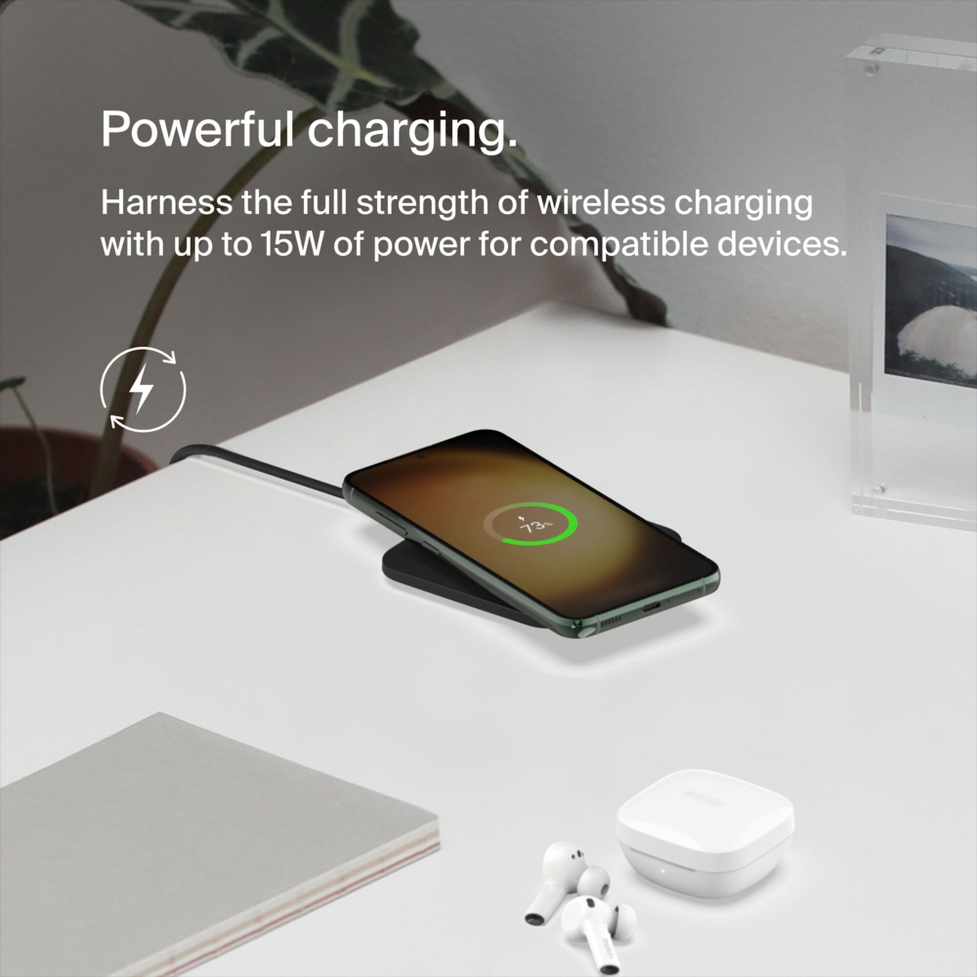 Belkin BoostCharge Pro Universal Easy Align 15W wireless charging pad in black with its attached USB-C power cable. — view 2