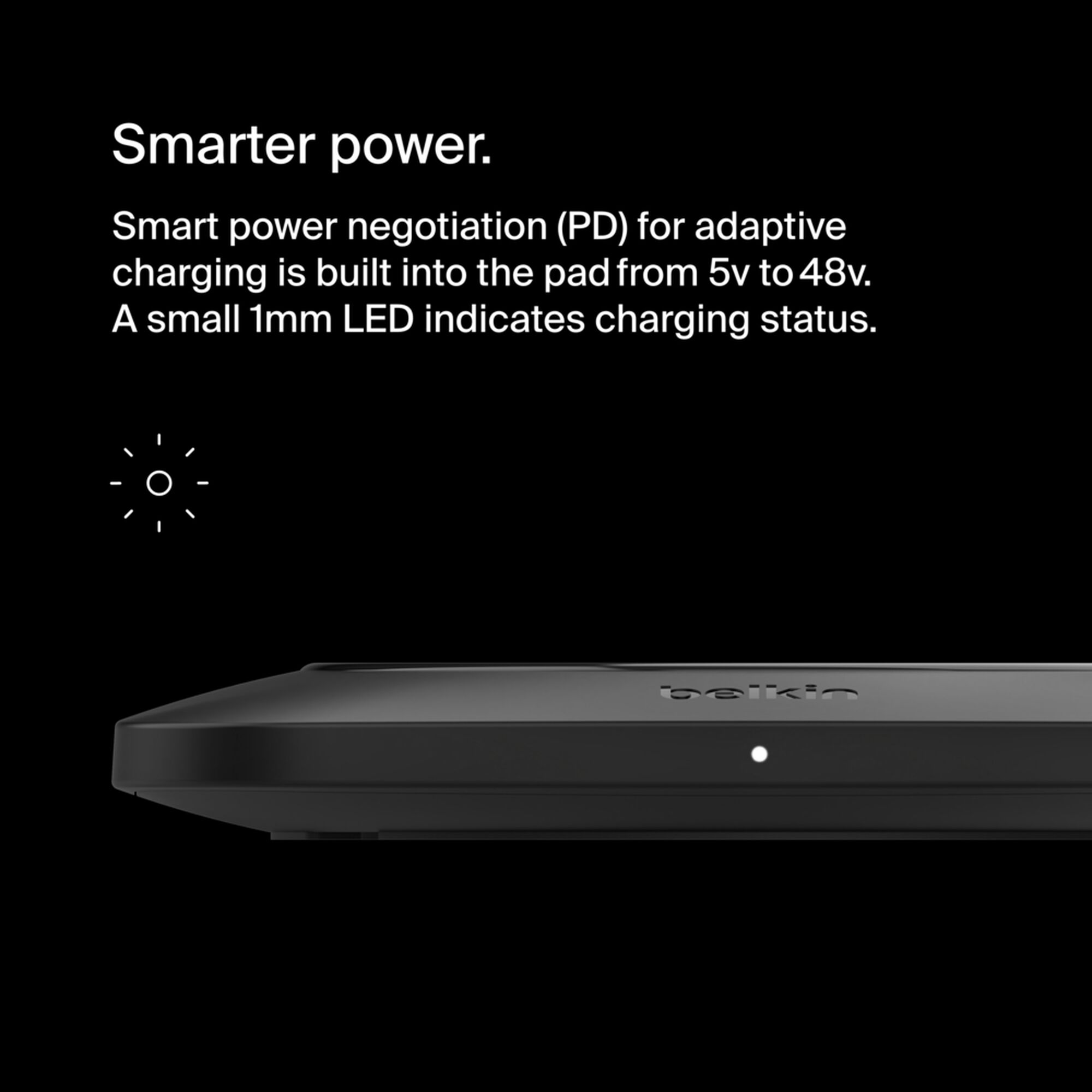 Belkin BoostCharge Pro Universal Easy Align 15W wireless charging pad in black with its attached USB-C power cable. — view 6