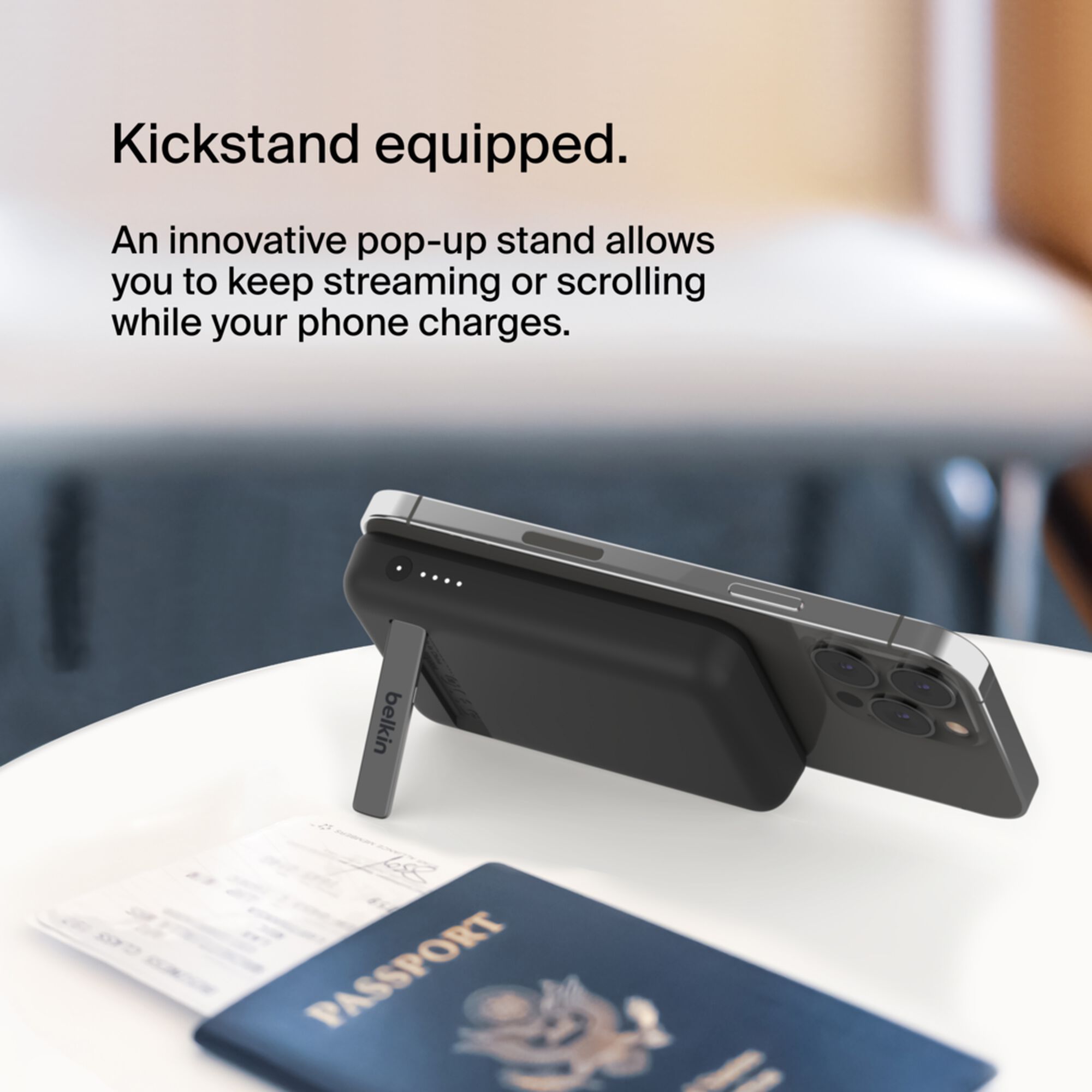 Black Belkin BoostCharge Magnetic Wireless Power Bank 5K with its metal fold-out kickstand extended. — view 5