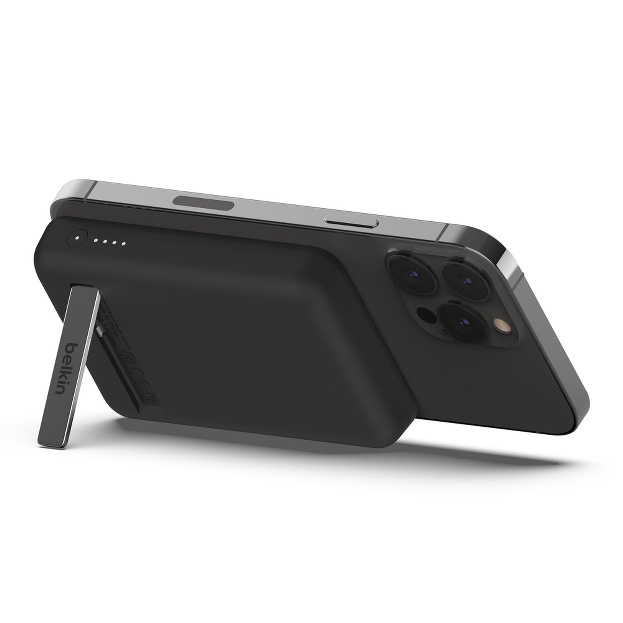 Black Belkin BoostCharge Magnetic Wireless Power Bank 5K with its metal fold-out kickstand extended. — view 9