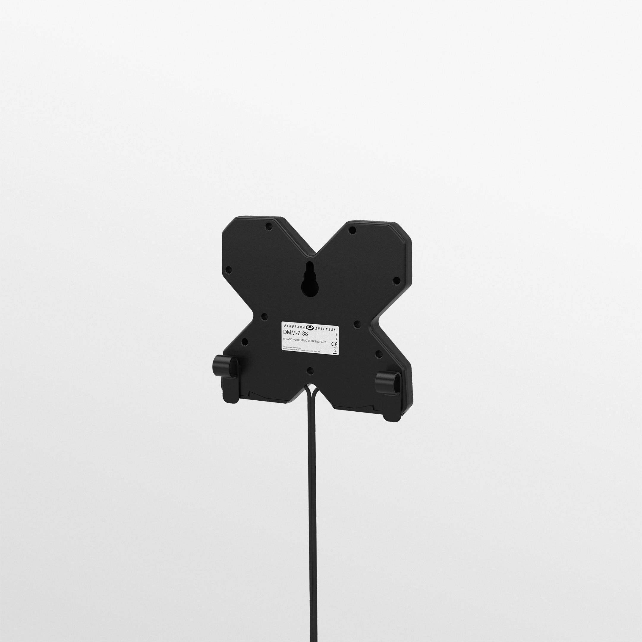 Black Panorama DMM-7-38-2SP compact X-shaped 4G/5G MIMO desk antenna on its feet with twin SMA cables. — view 5
