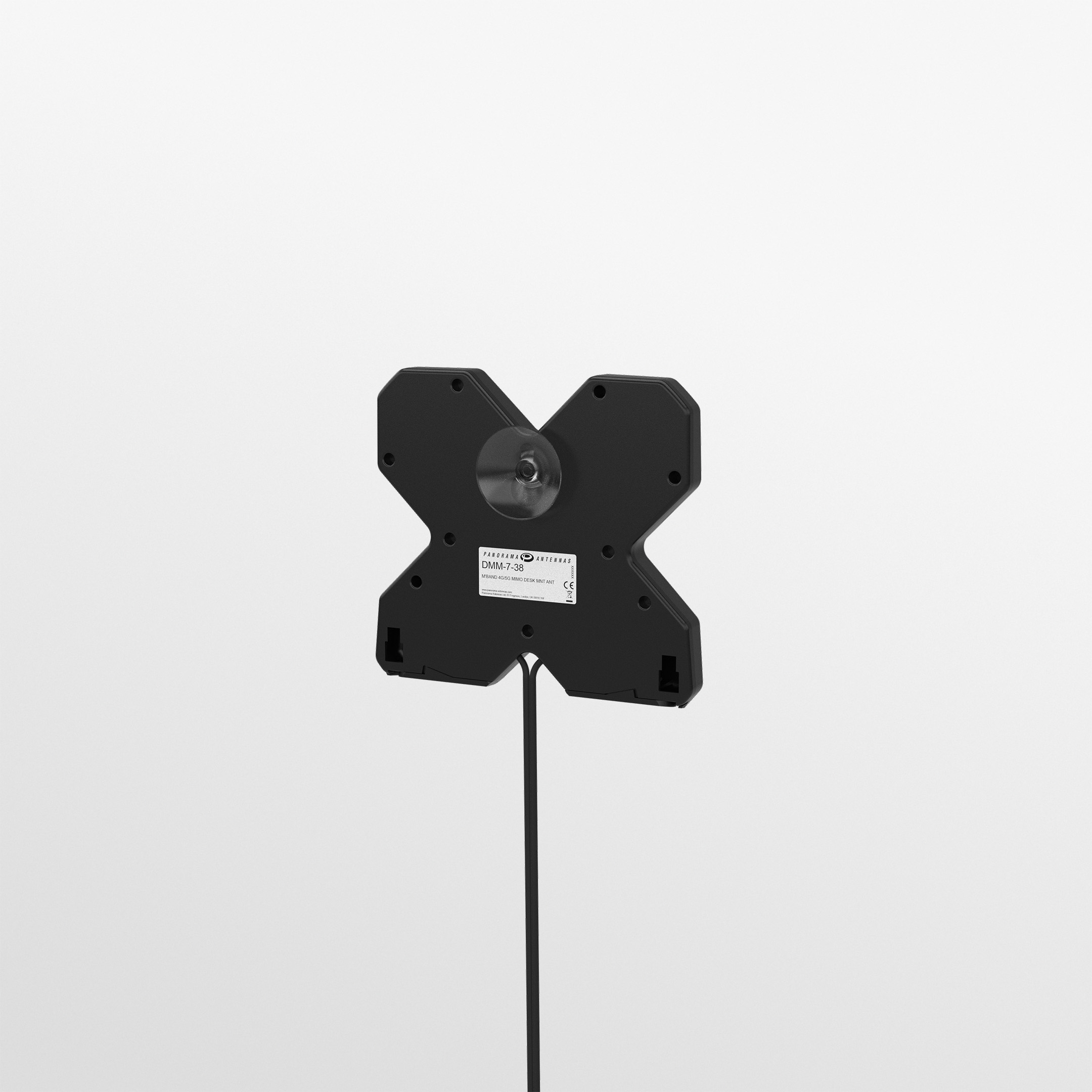 Black Panorama DMM-7-38-2SP compact X-shaped 4G/5G MIMO desk antenna on its feet with twin SMA cables. — view 6
