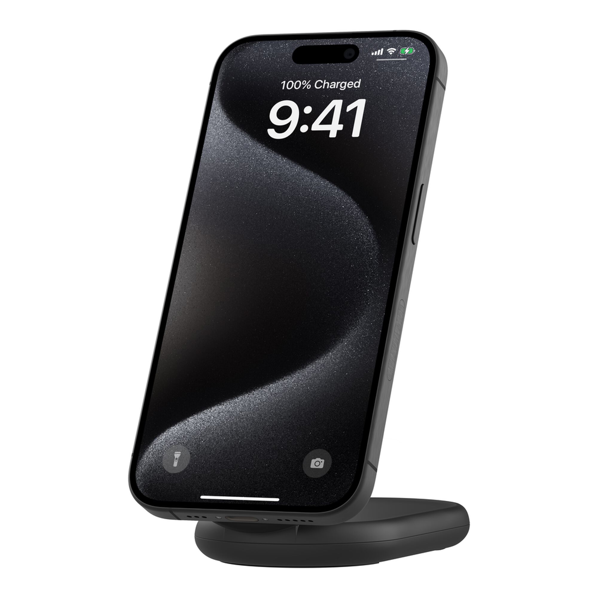 Black Belkin BoostCharge Qi2 15W magnetic foldable wireless charging stand holding an iPhone upright. — view 9
