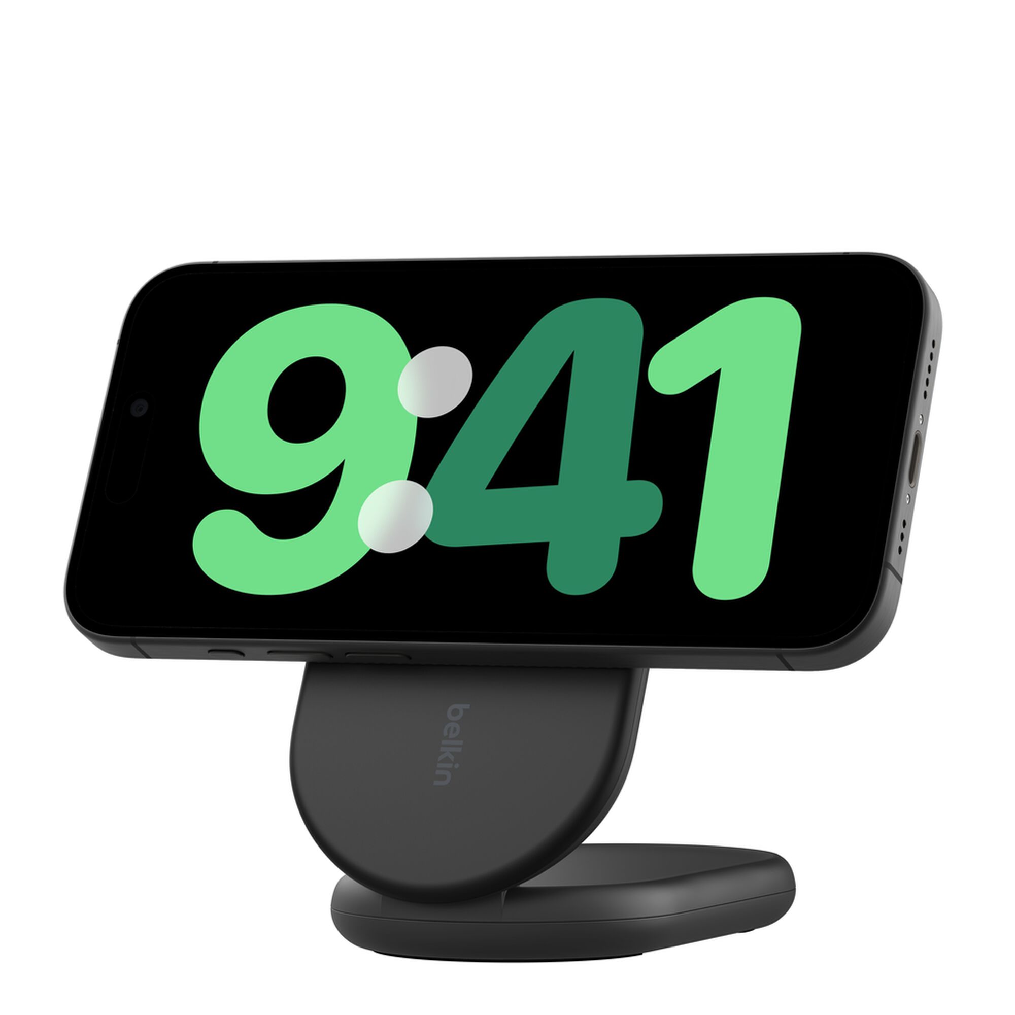 Black Belkin BoostCharge Qi2 15W magnetic foldable wireless charging stand holding an iPhone upright. — view 11