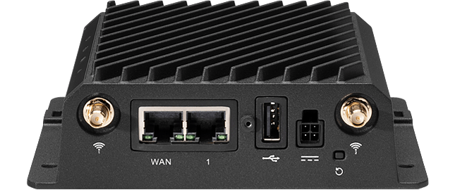 Cradlepoint R980 ruggedized 5G router in a compact metal housing with SMA antenna connectors and Ethernet ports. — view 2