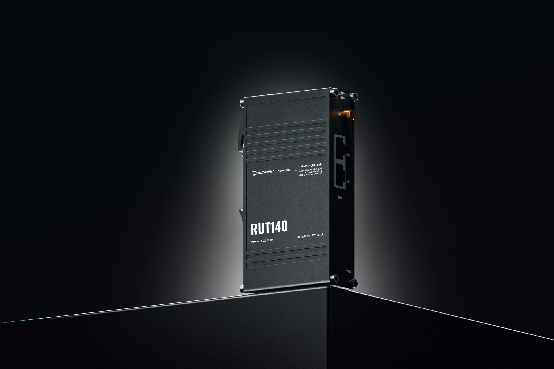 Teltonika RUT140 industrial Ethernet router with two 10/100 Mbps ports, Wi‑Fi 4, and DIN rail bracket — view 4