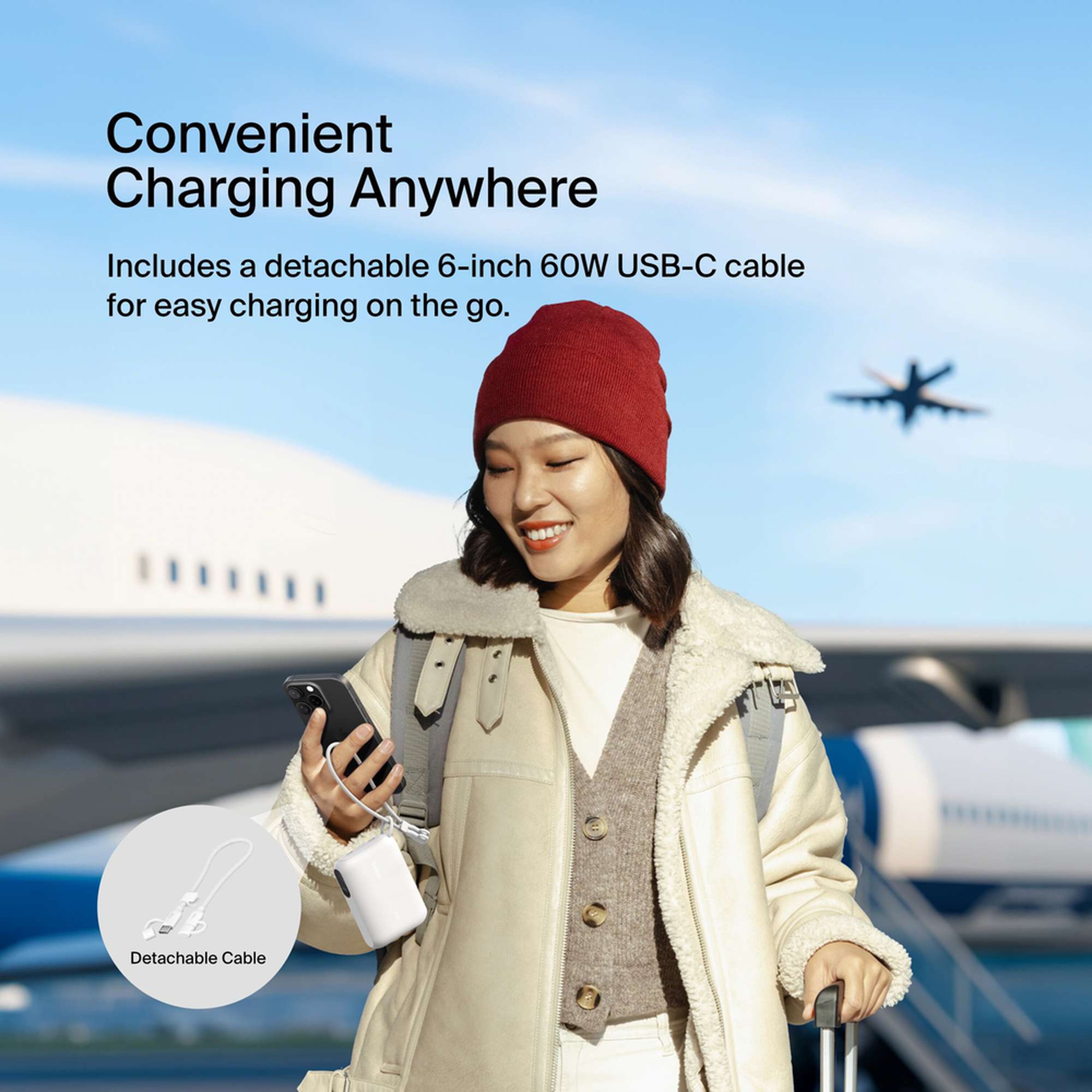 White Belkin BoostCharge 10,000 mAh power bank with a digital battery display and two USB-C ports. — view 5