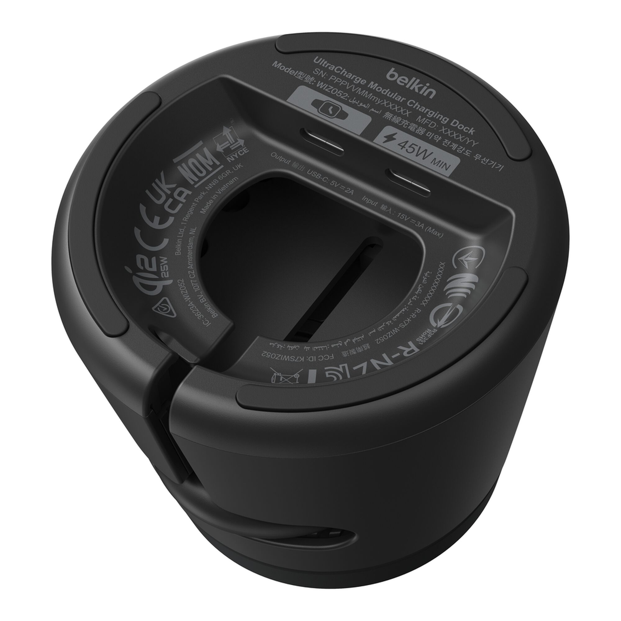 Black Belkin UltraCharge 3-in-1 modular charging dock with a phone on the Qi2 pad, earbuds on the lower pad and a smartwatch on the rear holder. — view 14