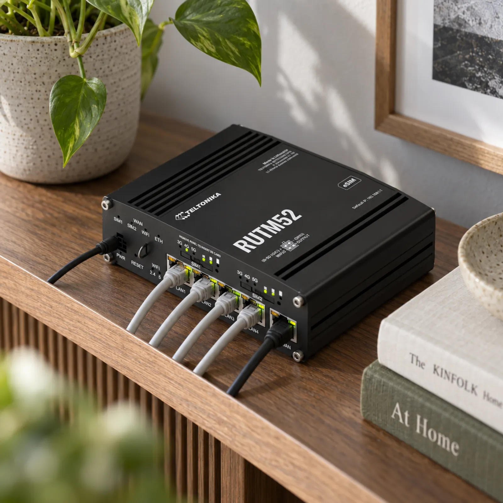 The 5G router on an office credenza