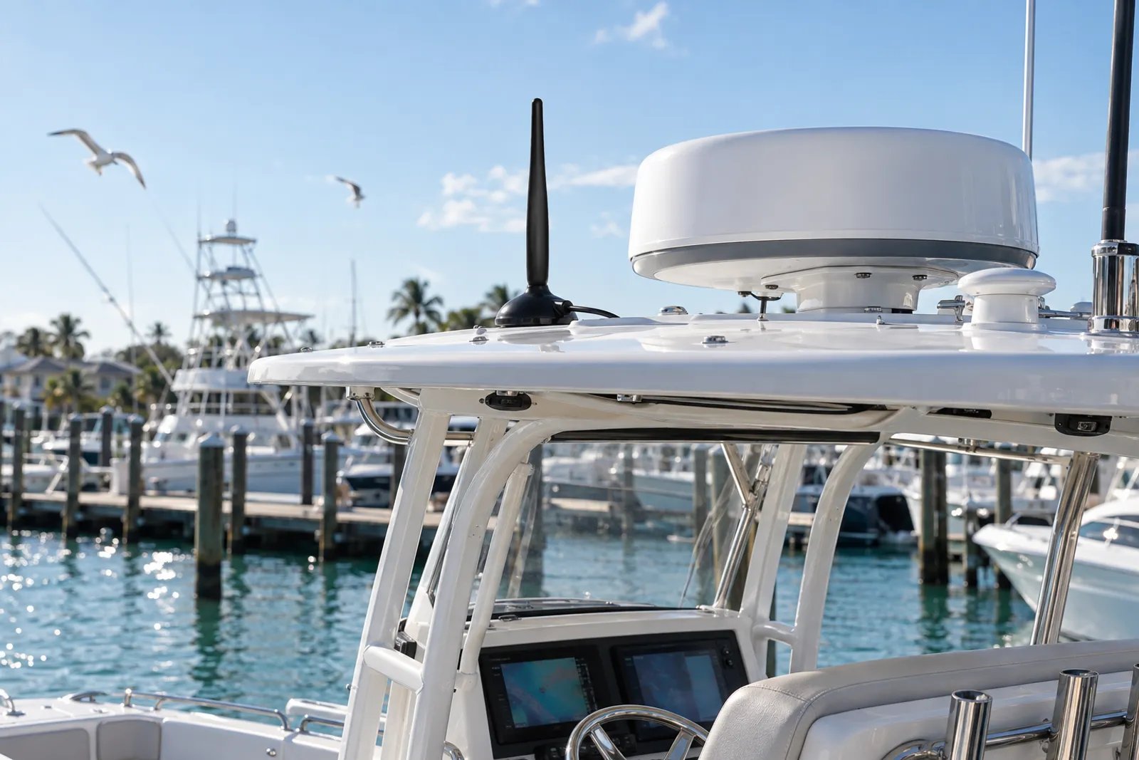 Center-console boat with a marine cellular antenna on the T-top
