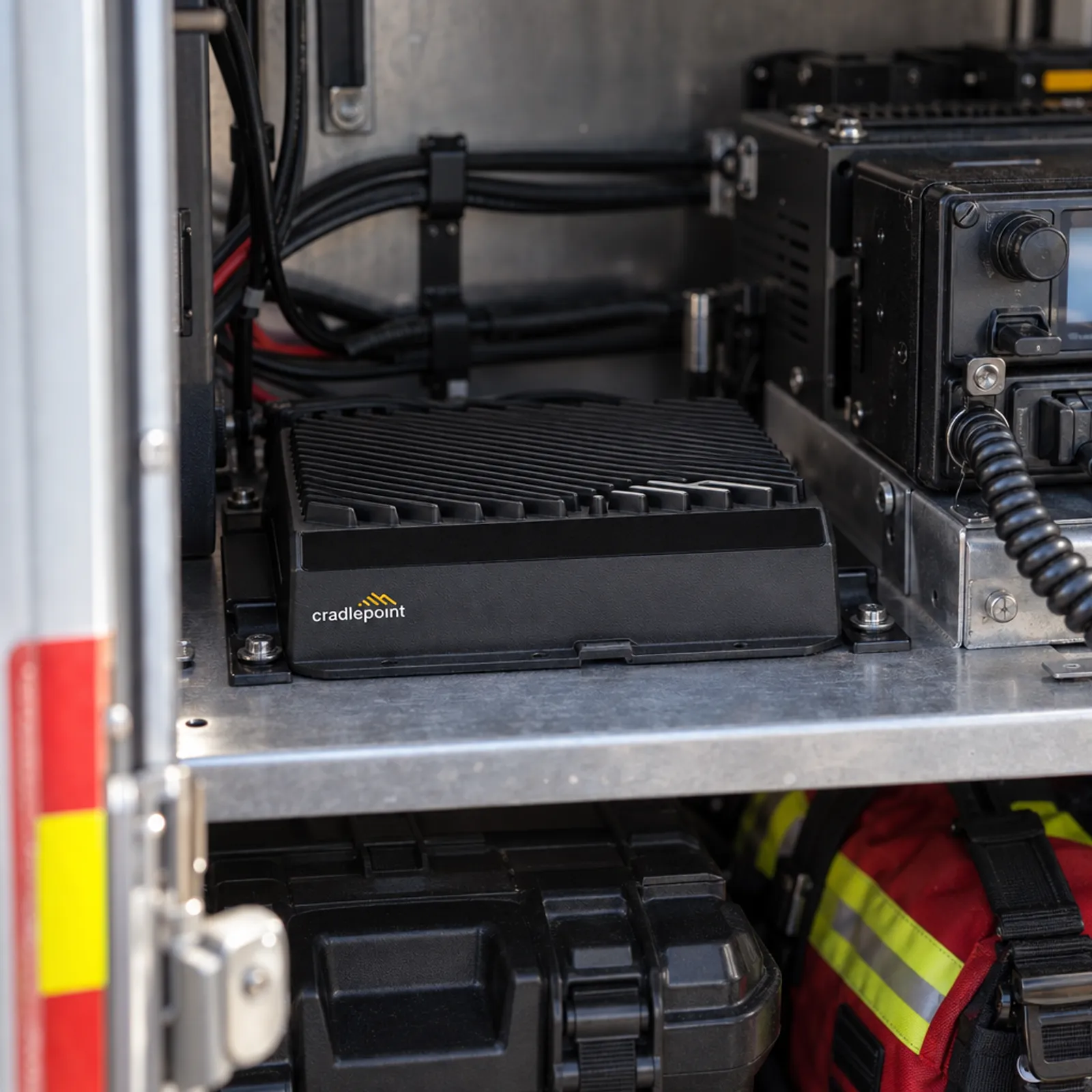 Rugged router mounted in an emergency vehicle